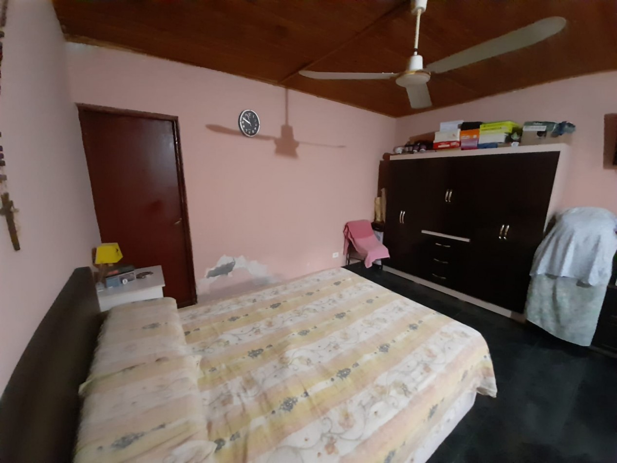 CASA EN MUÑECAS AL 2600 TERRENO 390 M2