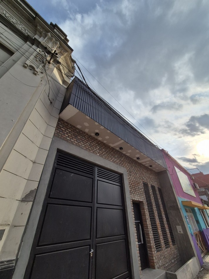 DEPOSITO A ESTRENAR CON OFICINAS EN AVENIDA SARMIENTO AL 1200